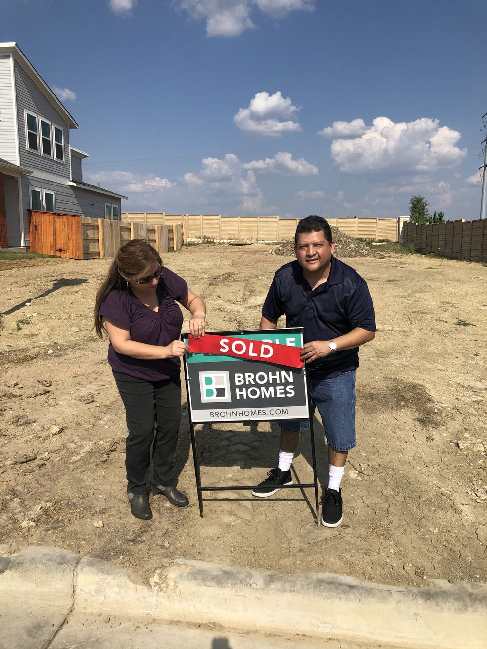 Real homeowners on closing day, South Austin · Brohn Homes